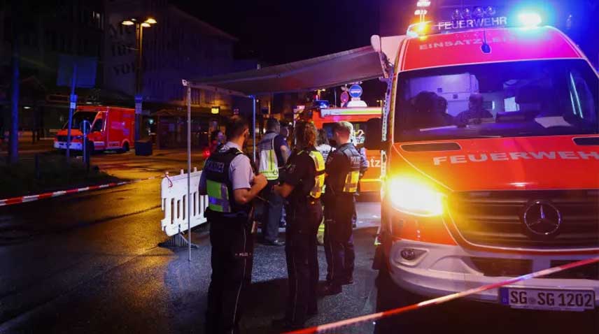 Security officials stand alert after the stabbing attack at a festival in the western German city of Solingen.