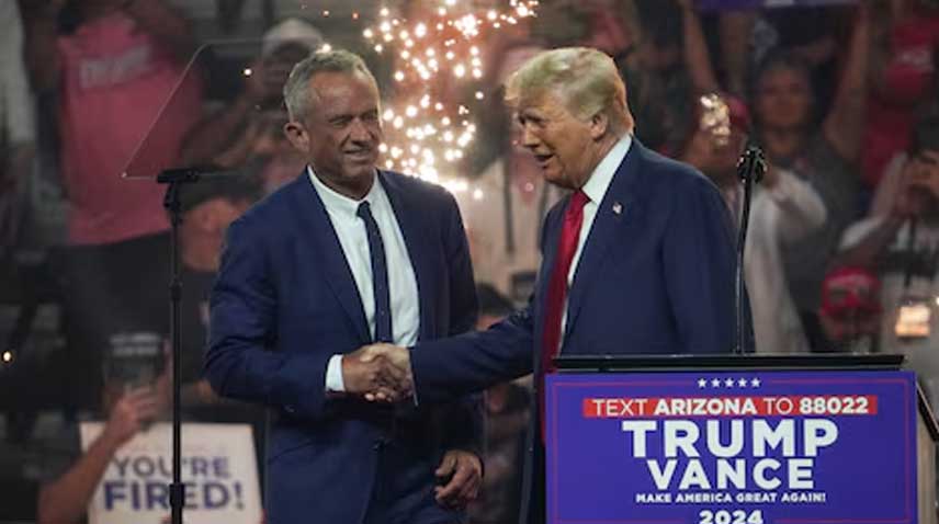 Robert F. Kennedy Jr. and Donald Trump shake hands