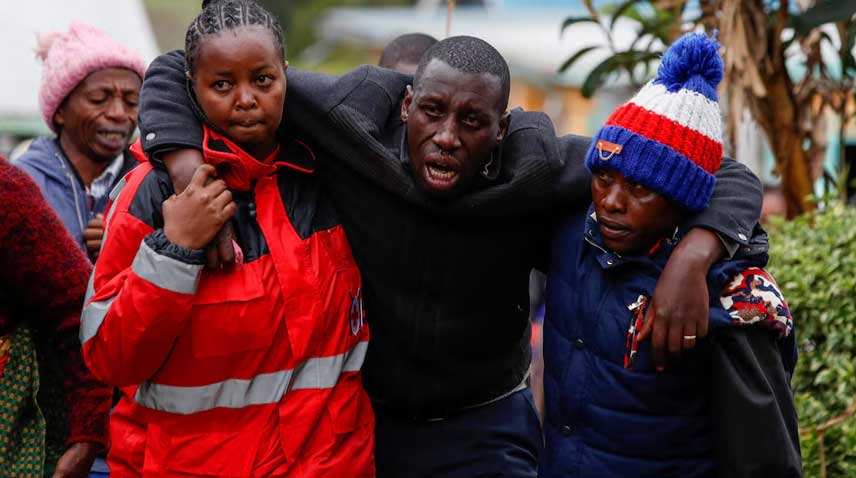 Parents of pupils who died during a fatal fire react at the Hillside Endarasha Academy, in Kieni, Nyeri County, Kenya.