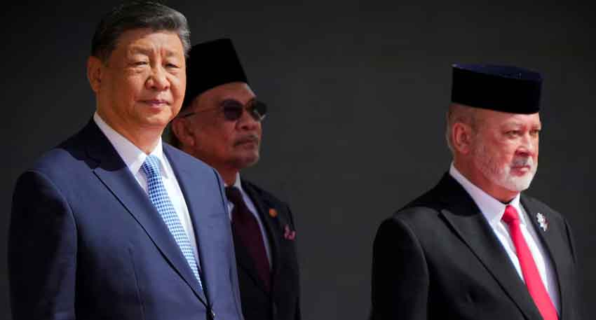 China's Xi calls for UN, multilateral systems to be upheld on Southeast Asia trip Malaysian King Sultan Ibrahim Sultan Iskandar, right, stands next to Chinese President Xi Jinping