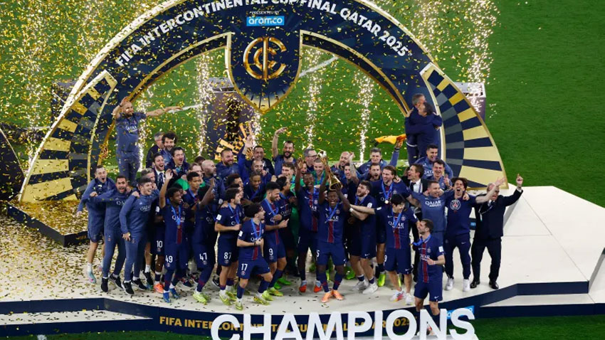 Paris Saint-Germain's Nuno Mendes lifts the trophy with teammates after winning the FIFA Intercontinental cup final. via Reuters]