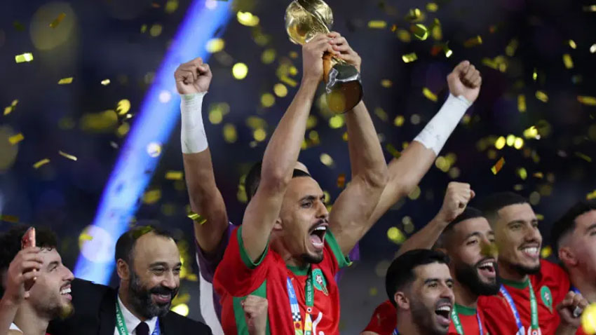 Morocco’s Soufiane Bouftini celebrates FIFA Arab Cup trophy after defeating Jordan at the Lusail Stadium, Qatar on December 18, 2025. via Reuters