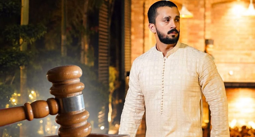 Youtuber Rajab Butt next to a judge's gavel.