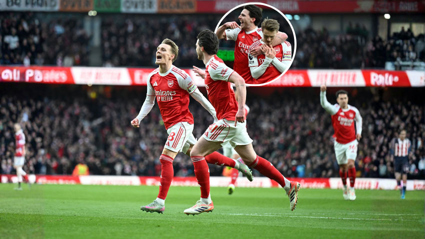 Martin Odegaard celebrates scoring the 1st Arsenal goal with (R) Declan Rice during the Premier League match. via Athlon Sports