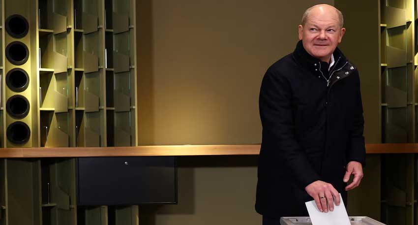 German Chancellor Olaf Scholz votes during the 2025 general election - REUTERS