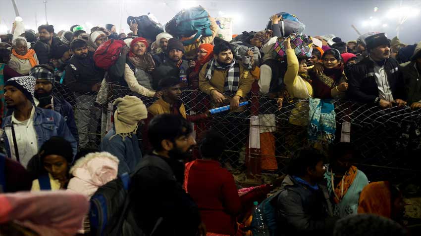 Devotees leave after a deadly stampede