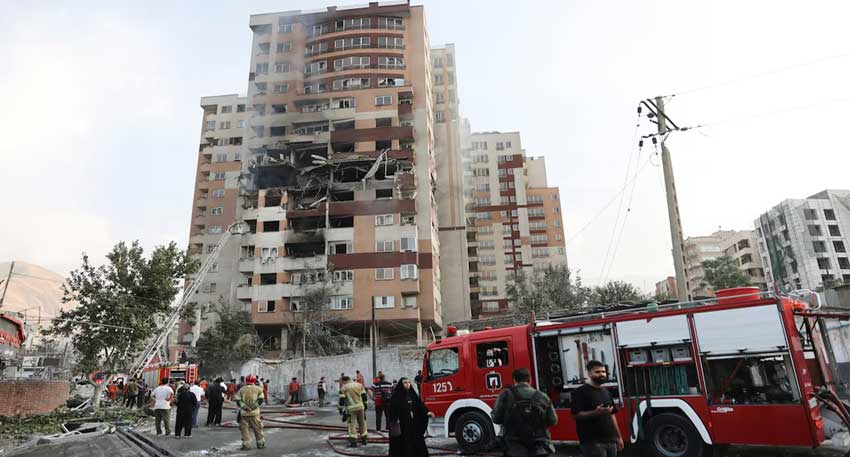Israel launches strikes on Iran Firefighters work at the scene of a damaged building in the aftermath of Israeli strikes, in Tehran