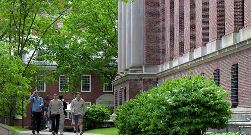 Trump administration halts scheduling of new student visa appointments Students walk on the campus of Harvard University