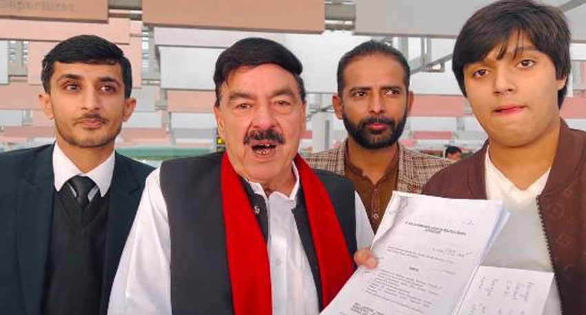 Sheikh Rashid at airport holding papers