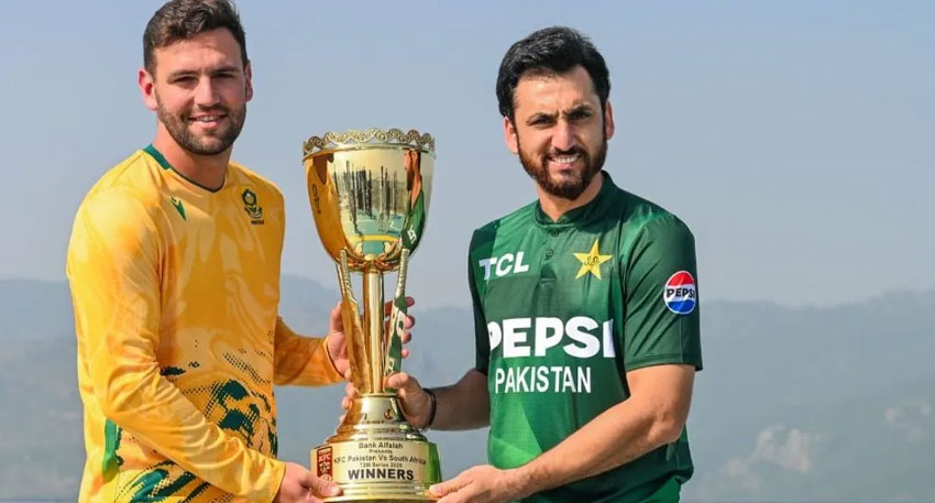 Salman Ali Agha and Donovan Ferreira holding the T20I series trophy.