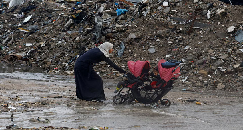 Floods swamp homeless Palestinians’ tents in Gaza as winter looms