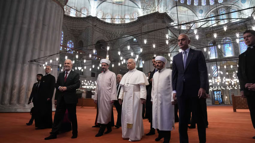 Pope Leo removes shoes in first mosque visit as a sign of respect