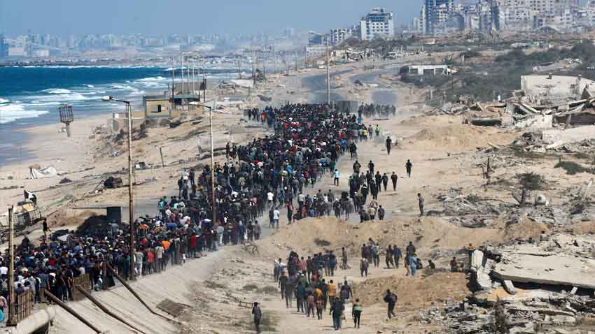 Palestinians return to Gaza homes as ceasefire offers a ray of hope Palestinians, who were displaced to the southern part of Gaza at Israel’s order during the war, walk along a road as they attempt to return to the north after a ceasefire between Israel and Hamas in Gaza went into effect, in the central Gaza Strip, October 10, 2025. Reuters