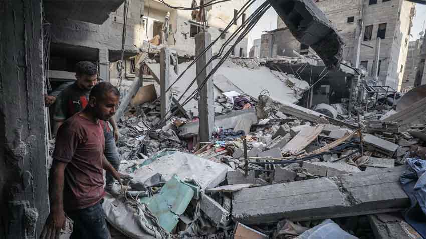 Residents inspect the rubble of destroyed buildings following an Israeli attack on Al-Shati, or Beach, refugee camp in Gaza City on September 23. CNN