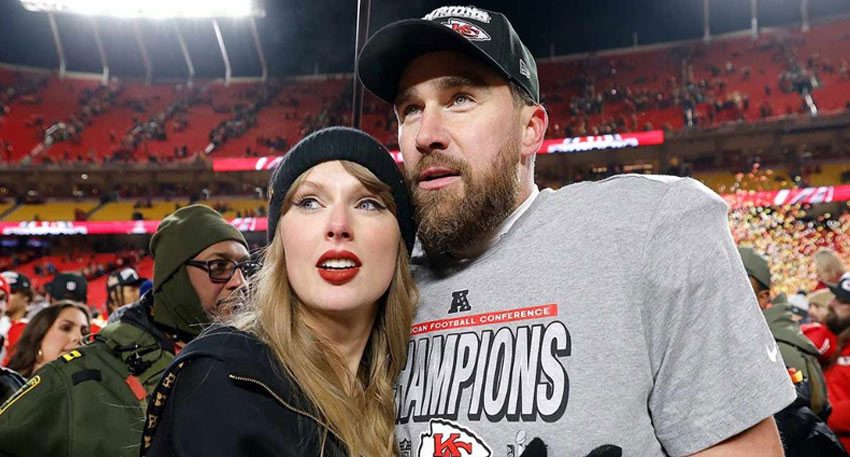 Taylor Swift and Travis Kelce pose together on the field after the Chiefs' AFC Championship victory.