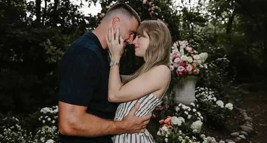 Taylor Swift and Travis Kelce embrace in a garden.