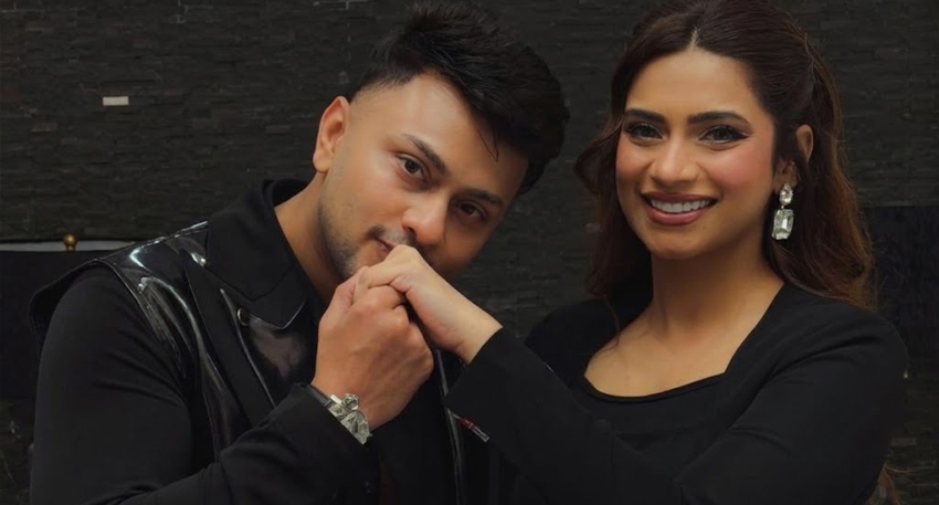 Awez Darbar holding Nagma Mirajkar’s hand in a close-up photo.