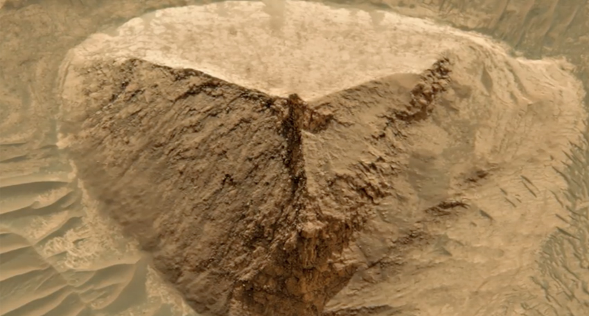 A pyramid-shaped formation spotted in Mars’ Candor Chasma region sparks curiosity.