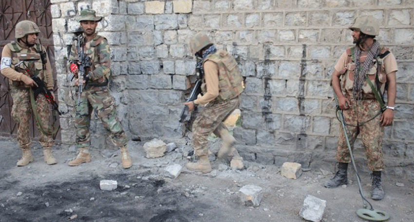 Security forces conducting an intelligence-based operation in Lakki Marwat and recovering weapons.