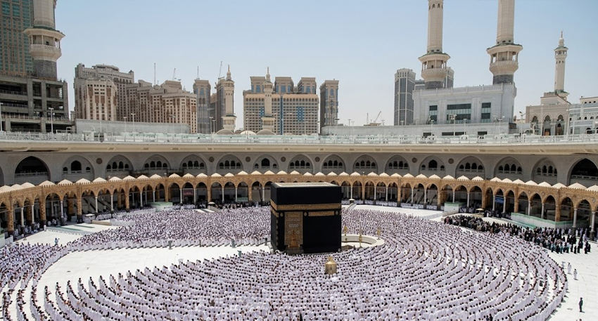 Pilgrims pray in concentric rows around the Kaaba inside Masjid al-Haram, Mecca.