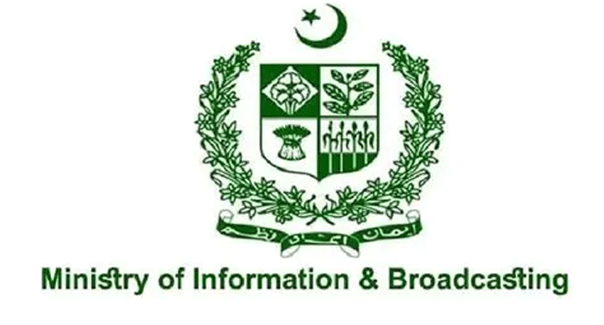 Foreign journalists covering a news event in Pakistan under new NOC restrictions.