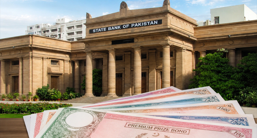 State Bank of Pakistan building with Premium Prize Bonds in the foreground.