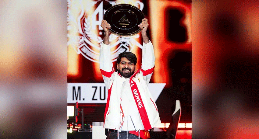 Muhammad Zubair celebrates after winning the Tekken 8 world championship at the Esports World Cup in Paris