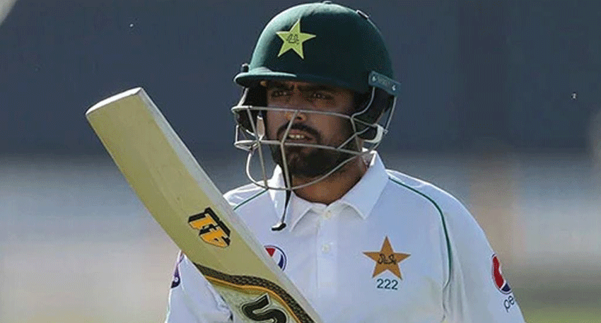 Pakistan captain Babar Azam holds his injured hand during a warm-up match before the England Test series.