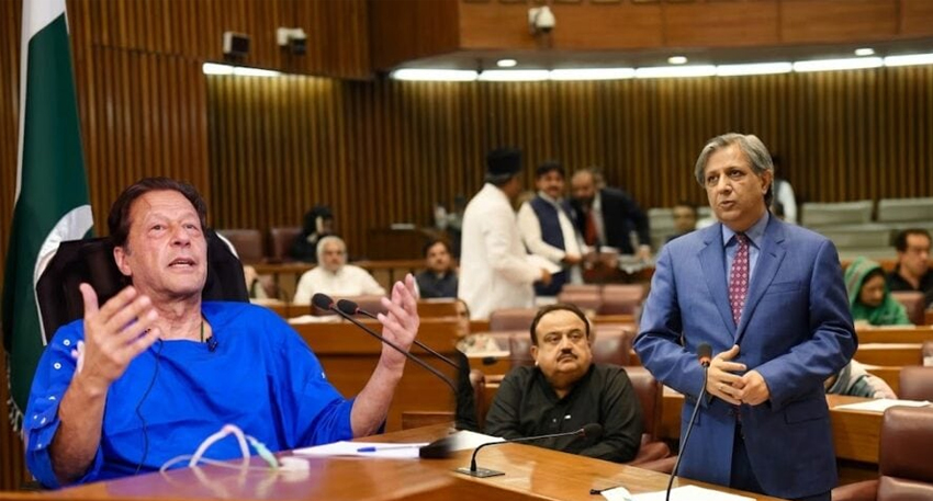 Imran Khan talking and Azam Nazeer Tarar standing in Pakistan assembly.