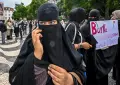 Portugal enacts full-face veil ban after far-right support