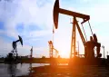 Oil prices climb again as global crude market faces fresh pressure