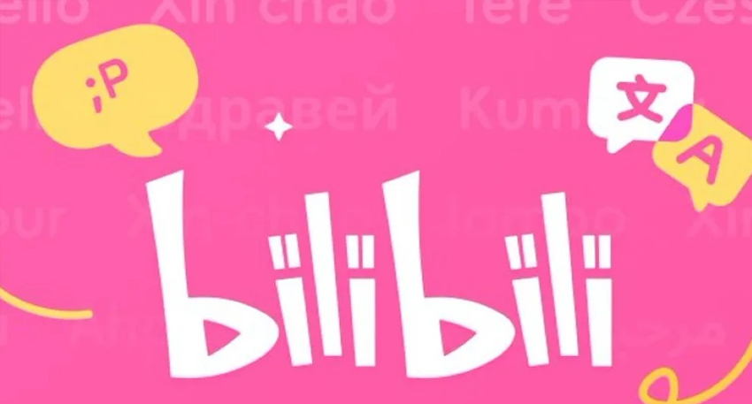 Bilibili logo in white stylized text over a pink background with speech bubbles showing translation and emoticon symbols.