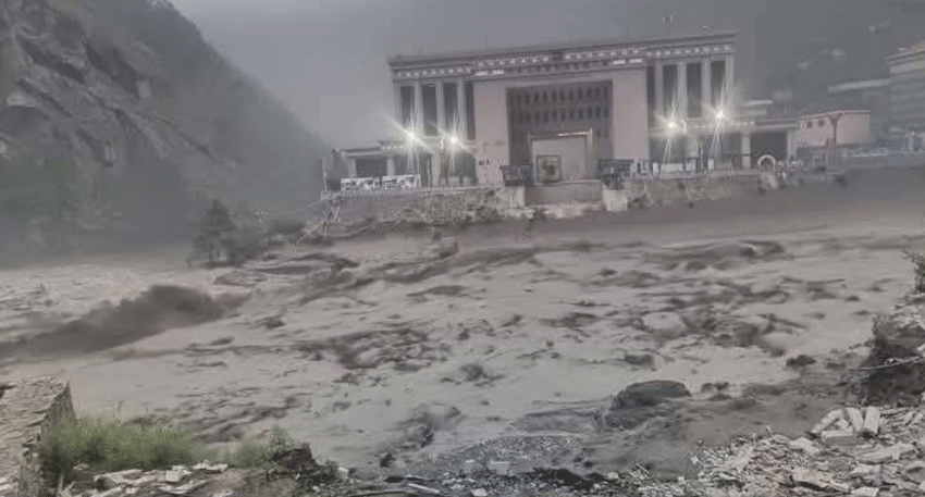 Floodwaters and debris devastate areas along the Nepal-China border as rescue teams search for missing people.
