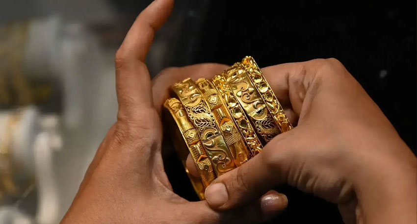 Gold and silver prices surge again as investors rush