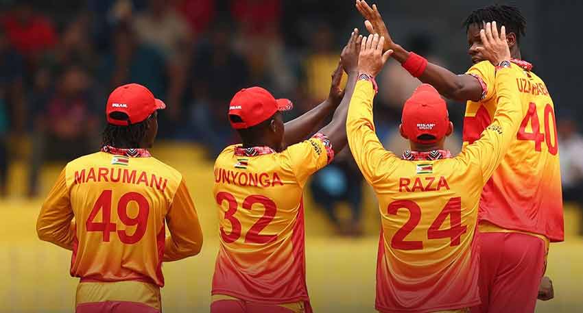 Zimbabwe national cricket team players celebrating their historic win against Australia in a T20 match.