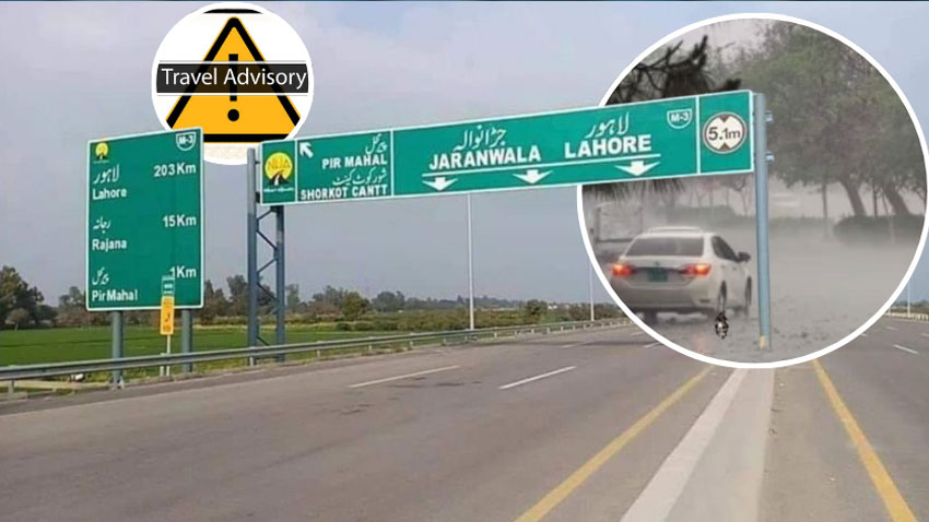 Lahore motorway with travel advisory sign and torrential rain picture. File Photo