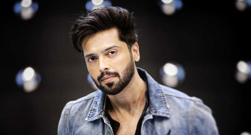Pakistani actor and television host Fahad Mustafa poses for a portrait in a denim jacket. photo: Google