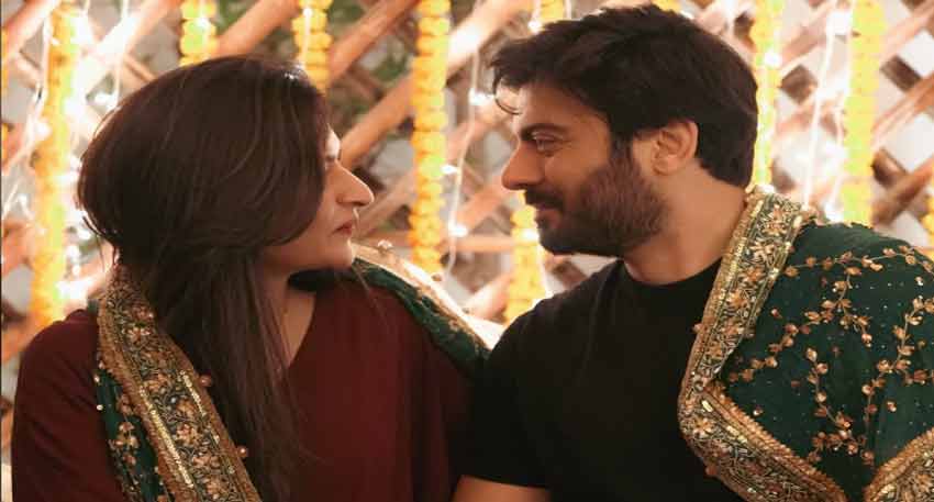 Pakistani actor Fawad Khan and his wife Sadaf Fawad Khan gaze at each other during their 21st wedding anniversary celebration.