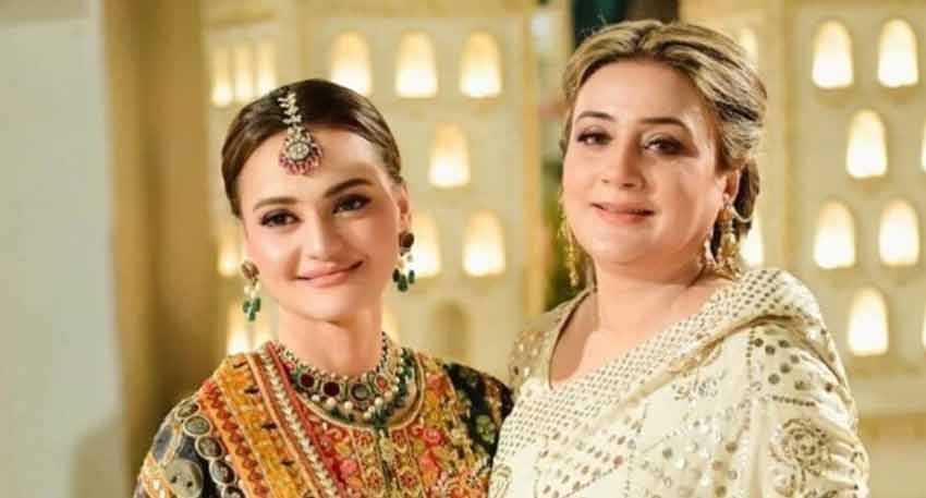 Pakistani politicians Maryam Aurangzeb and Azma Bokhari in traditional dress at Junaid Safdar's mehndi ceremony.