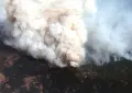 US wildfires spread across four states as satellite footage captures thick smoke and fire activity