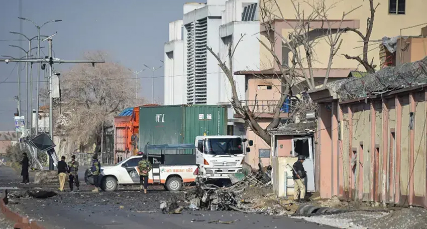Security personnel stand at the blast site in Quetta on Feb 1, 2026, a day after a terrorist attack