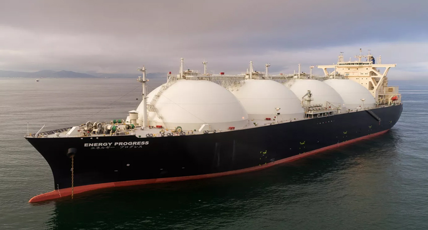 A ship with four large white domes moves through open water A liquefied natural gas (LNG) tanker in the Sea of Japan near Nakhodka, Russia
