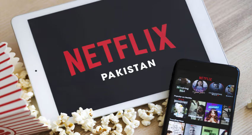 Tablet and phone showing Netflix Pakistan logo and interface with popcorn.