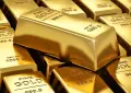 Gold prices fall sharply as global markets react to oil surge