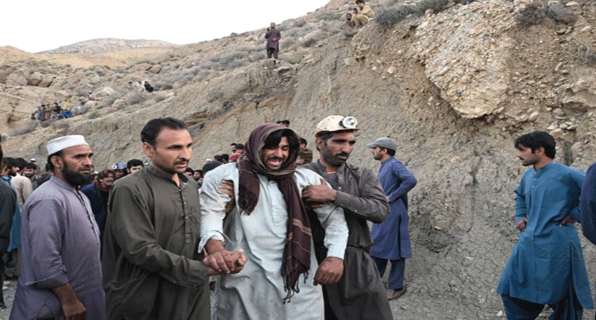 Rescue teams search a Balochistan coal mine after an explosion killed at least 32 miners near Quetta