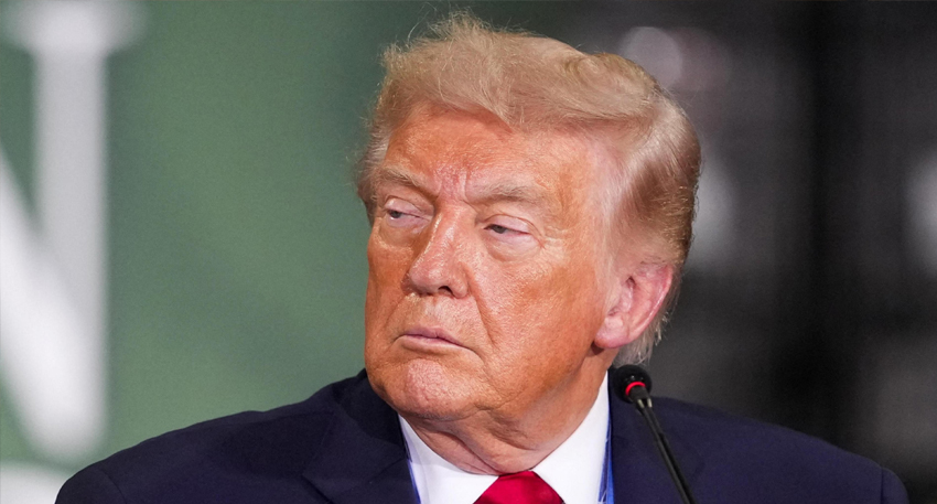 Donald Trump looking off-camera during a June 2026 press event.