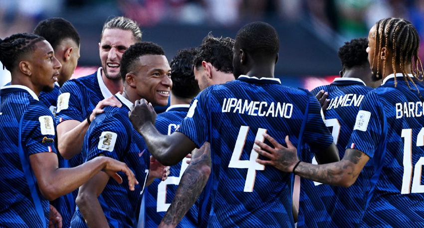 France players, including Mbappé and Upamecano, celebrate a goal during the 2026 FIFA World Cup.