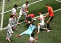 Belgium see red as Iran hold them to a goalless draw