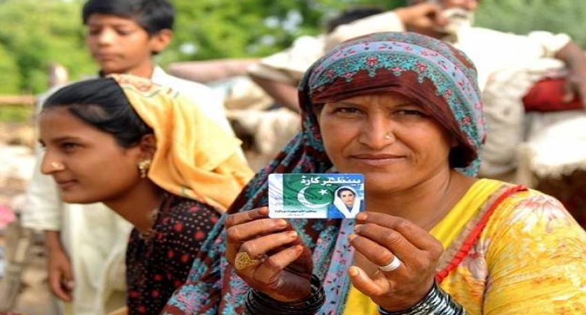 Woman holding BISP card