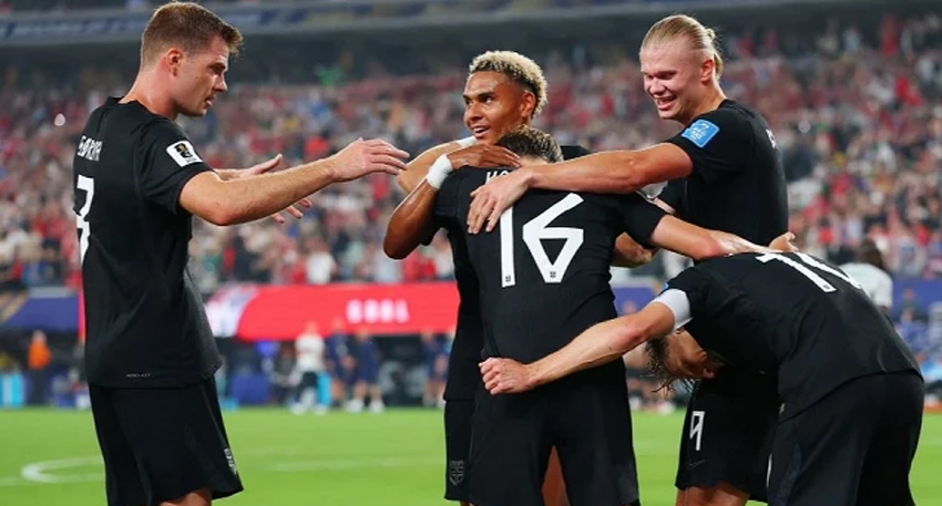 Norway players in black jerseys celebrate a goal during the FIFA World Cup 2026 match against Senegal.